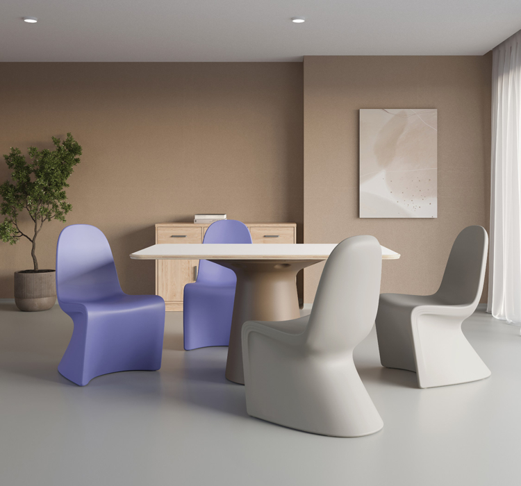 Trois chaises Ryno 2.0 en coloris violet, gris et orange disposées autour d’une table ronde, dans un espace intérieur moderne.