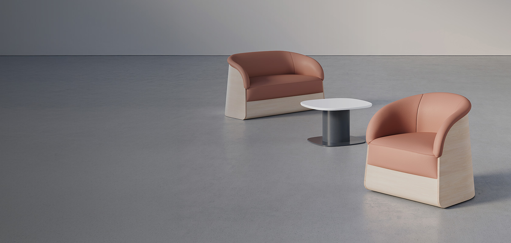 Fauteuil et canapé 2 places Domus Plus 2.0 avec revêtement rose poudré et structure en contreplaqué bouleau, présentés autour d’une table basse dans un espace de détente sécurisé et accueillant.